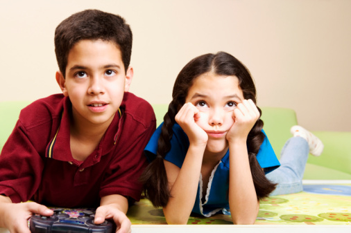 Sister bored with brother's video games